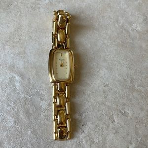 Pulsar lady battery water resistant gold tone